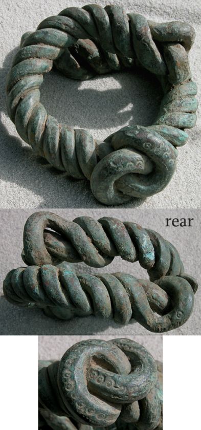 african coiled copper currency w knot calabar nigeria  